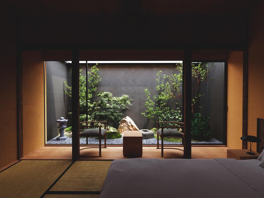 A private garden framed by a tatami bedroom at Mibu Garden Machiya in Kyoto